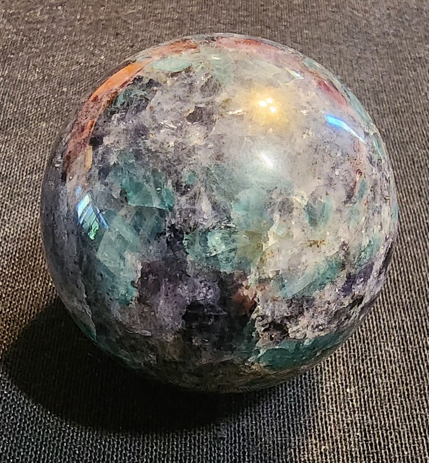 Cordierite sphere with Emerald