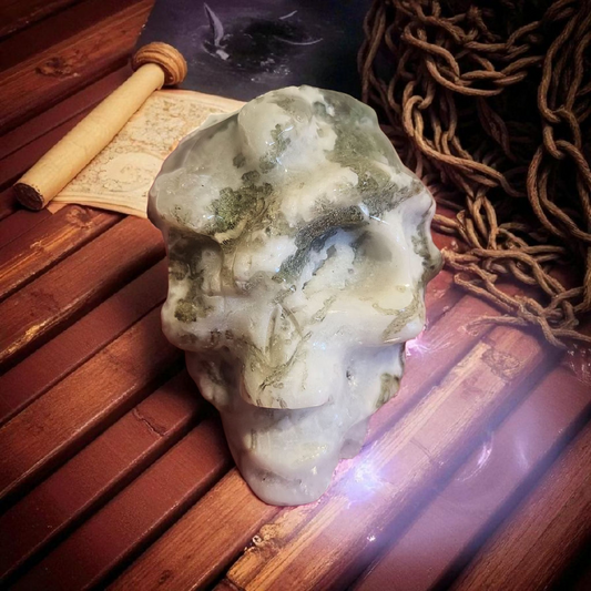 Unique moss agate skull carving